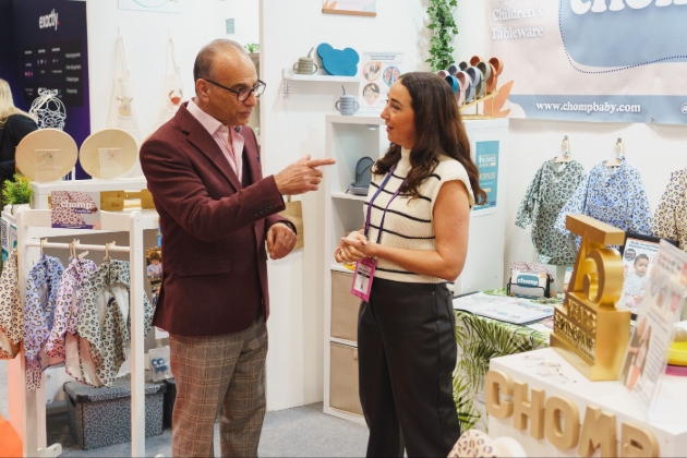 man and lady chatting at trade show